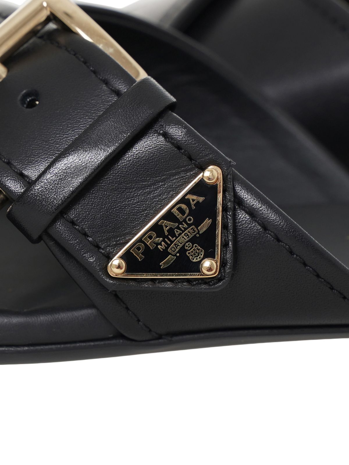 Crisscross Slides with Triangle Logo Buckle Leather Black